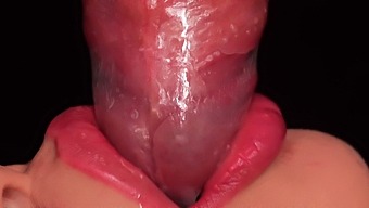 Intense Close-Up Of Milking Mouth Action With Condom Cumshot