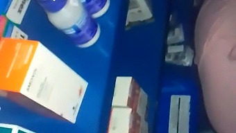 Intimate Encounter In A Pharmacy Among Various Medications