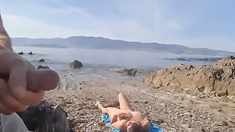 A Daring Man Exposes Himself To A Nudist Milf Who Performs Oral Sex On Him At The Beach
